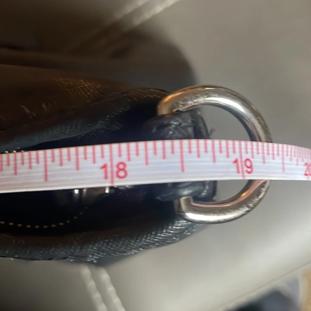 Coach shoulder bag preowned handles are cracking just at the shoulder area